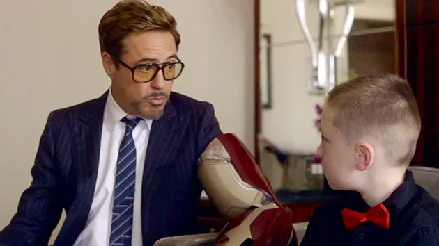 Iron Man donates a bionic arm to a 7yr. boy: a real hero!
