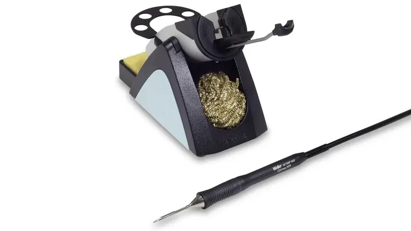 WT2023M's WTMP MS micro-soldering iron next to the WSR 205 stand with brass sponge and Stop-and-Go cable holder